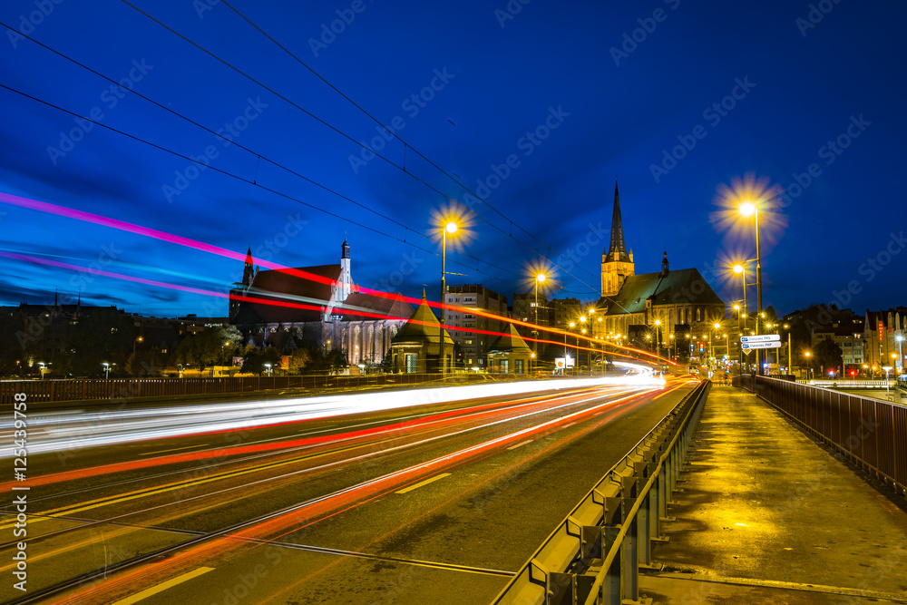 Fototapeta premium access road to the night city, Szczecin, Poland 