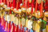 Golden bell at Wong Tai Sin Temple people wish and hang it on ro