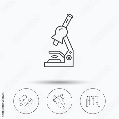 Microscope, medical pills and heart icons.