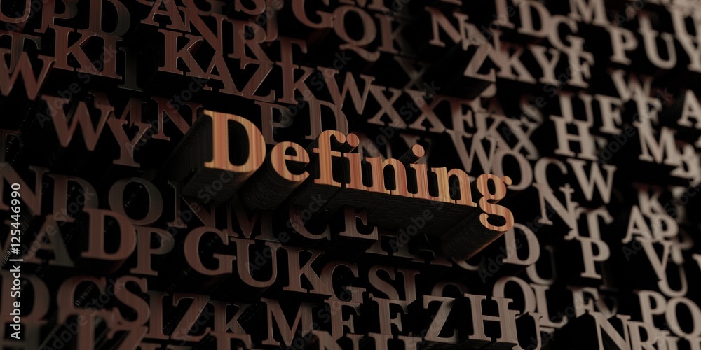Defining - Wooden 3D rendered letters/message.  Can be used for an online banner ad or a print postcard.