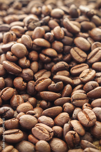 Coffee beans background. over light [blur and select focus background] 