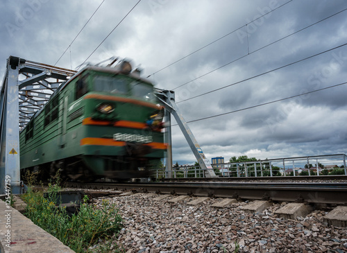 The train goes over the bridge, motion blur