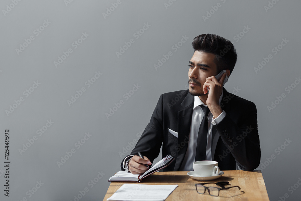 businessman talking on phone office in cafe. copy space businessman talking on phone office in cafe. copy space