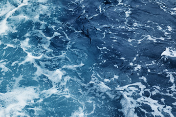 Fotobehang Oceaan golven Gerimpelde oceaangolven in beweging  © Alex