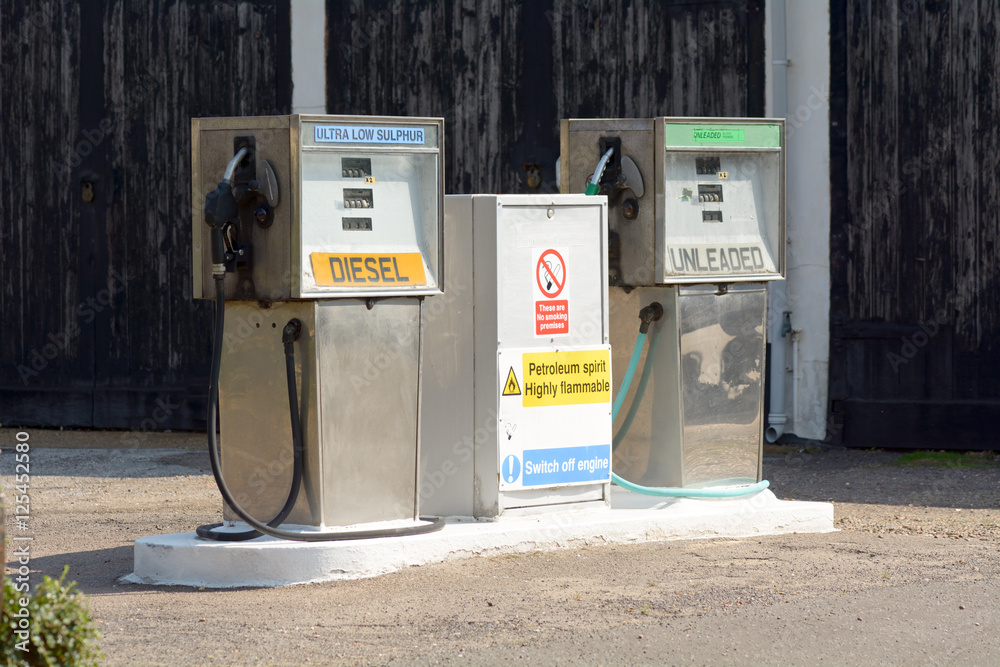 Old fashioned petrol pumps for diesel and unleaded fuel Old fashioned petrol pumps for diesel and unleaded fuel