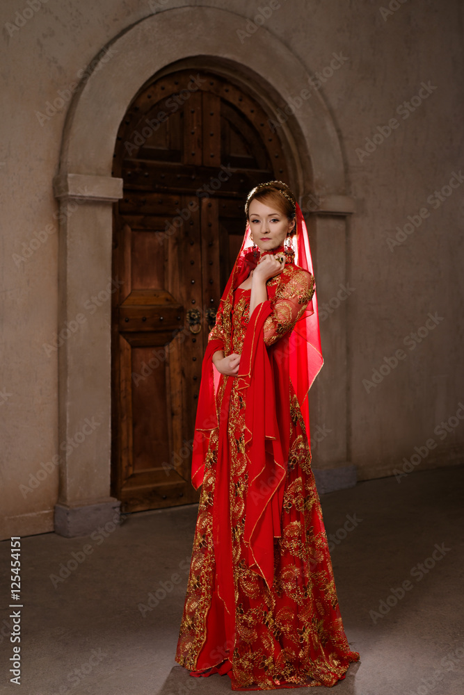 Girl at the image of Turkish sultan's wife