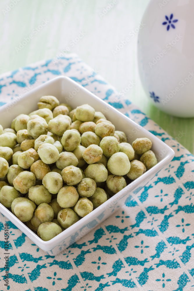 Wasabi peas a crunchy Japanese snack seasoned with hot Wasabi Wasabi peas a crunchy Japanese snack seasoned with hot Wasabi