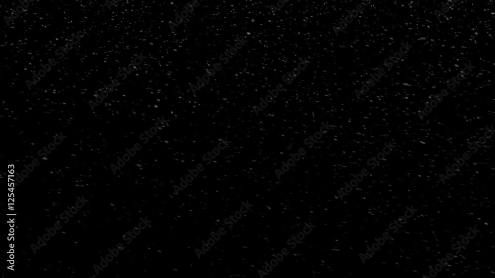 Falling snowflakes, black background, white on black, isolated