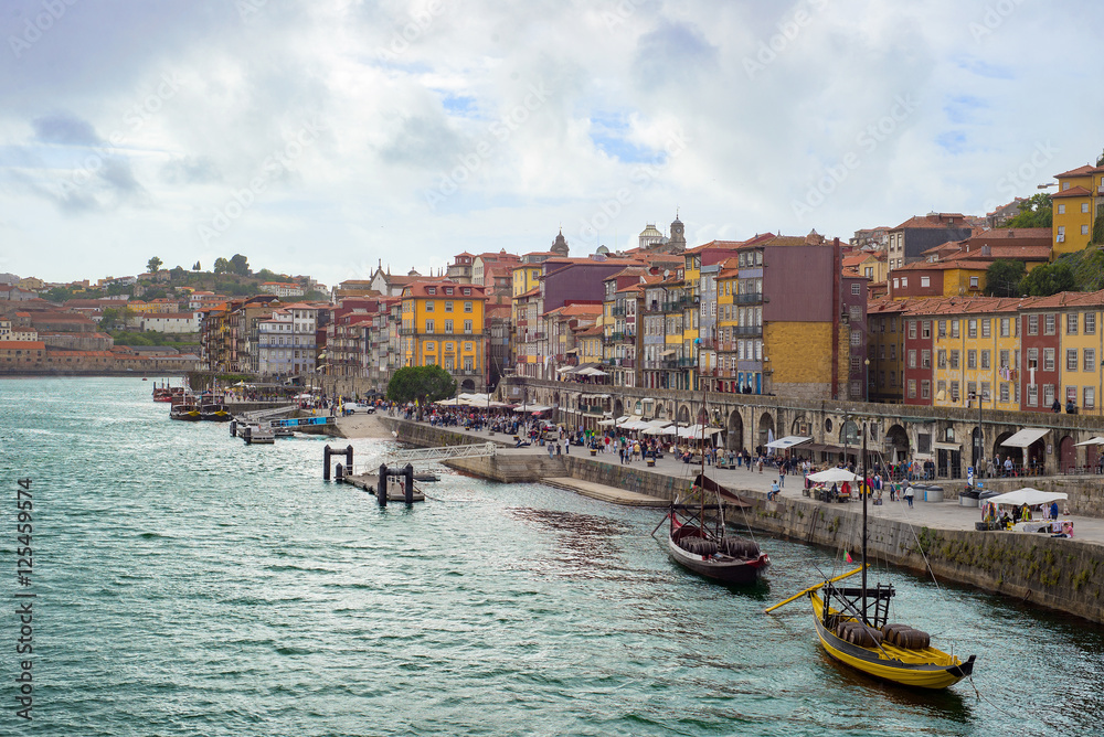 Fototapeta premium Porto city Douro river embankment ribeira historic town panorama romantic promenade market boats 