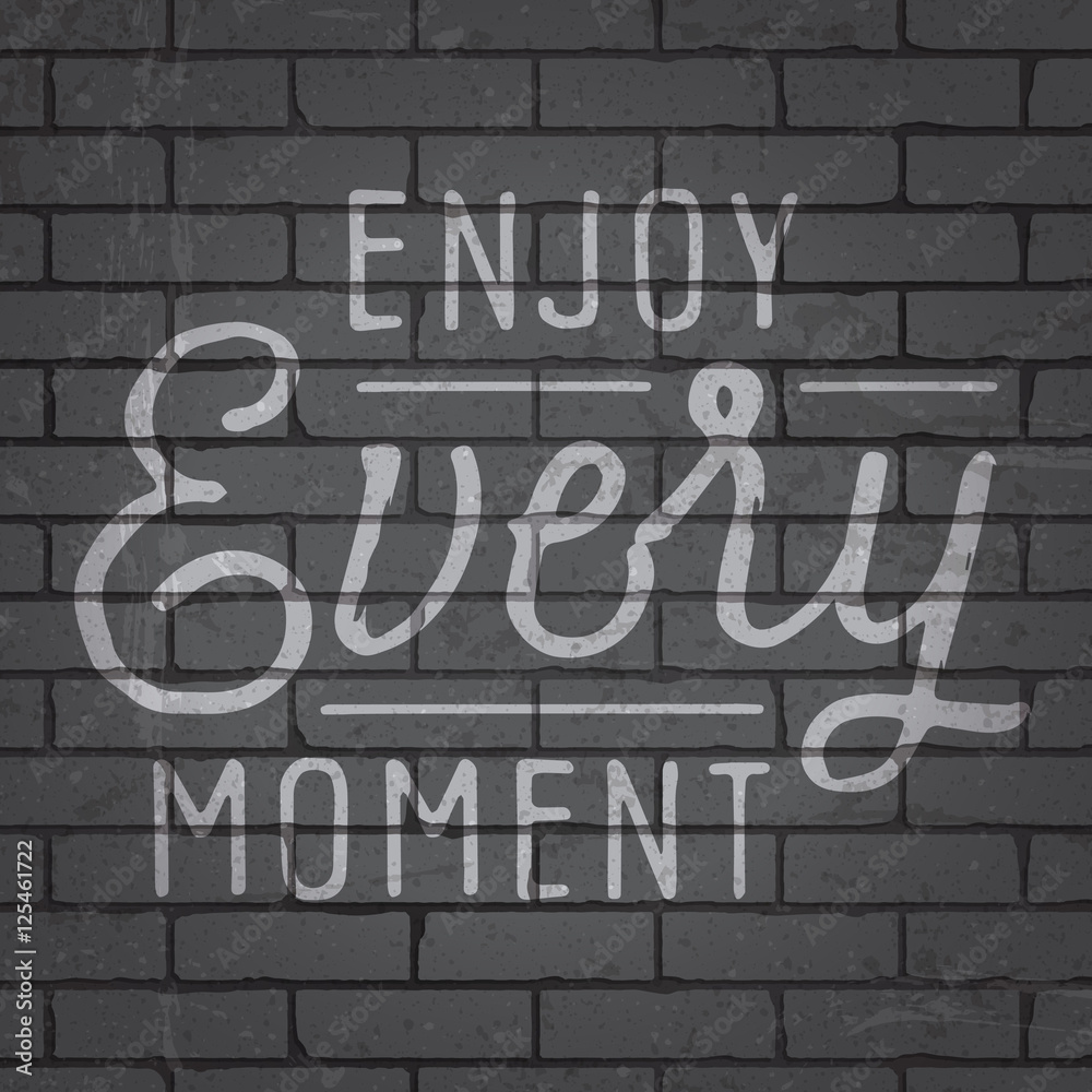 Hand drawn lettering slogan on brick wall background Hand drawn lettering slogan on brick wall background