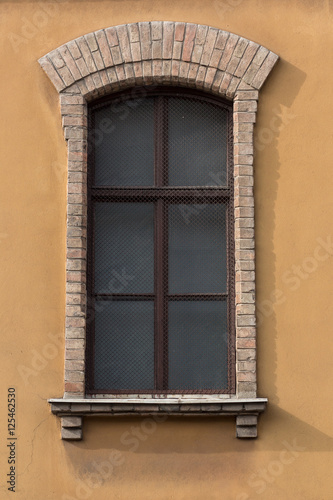 Retro looking window with brick frame