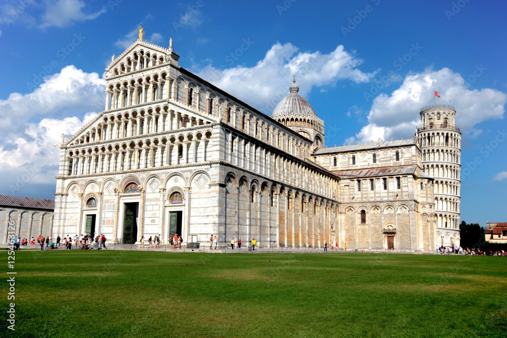 The Cathedral of Pisa and the Pisa Tower in Pisa, Italy. The leaning tower of Pisa is one of the most famous tourist destinations in the world which is located in Pisa town in north Italy.