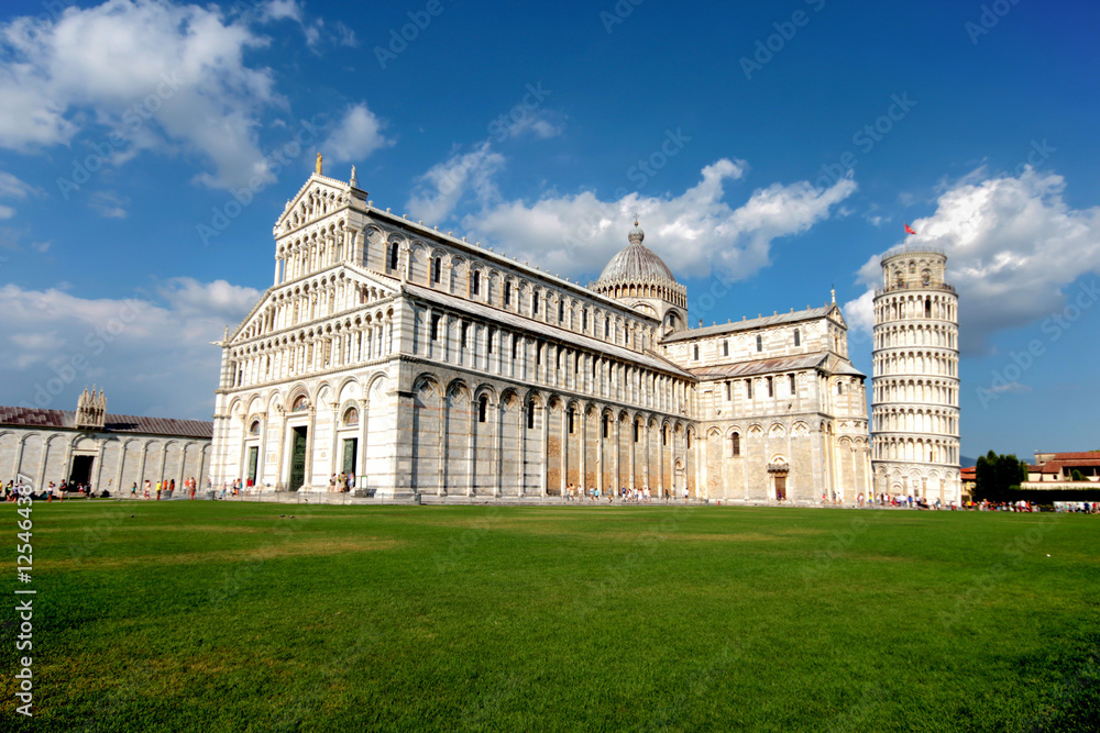 The Cathedral of Pisa and the Pisa Tower in Pisa, Italy. The leaning tower of Pisa is one of the most famous tourist destinations in the world which is located in Pisa town in north Italy.