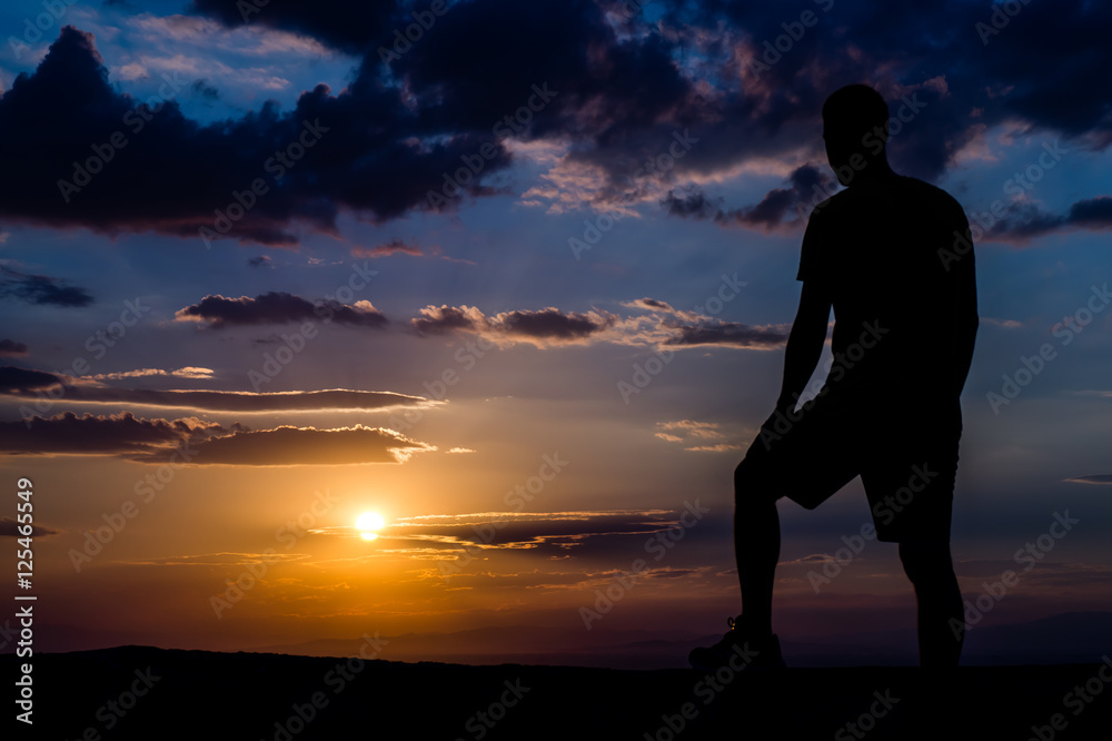 Standing Man watching the Sun