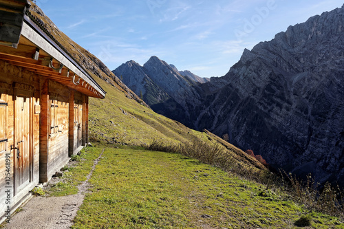 Mountain hut with view to the valley called Tortal in the Karwendel mountains, alps, tyrol, Austria, Bavaria, Germany photo