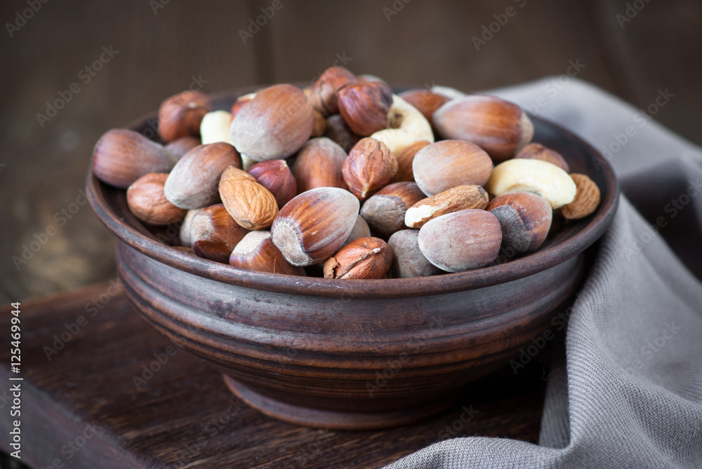 Selection of nuts - Hazelnuts, almonds, cashew. Selection of nuts - Hazelnuts, almonds, cashew.