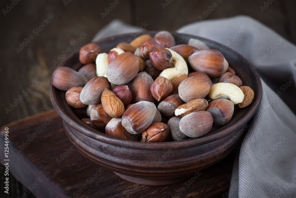 Selection of nuts - Hazelnuts, almonds, cashew.