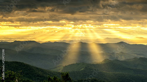 Ray of light landscape, View of mountains with ray of morning gold light. © virojt