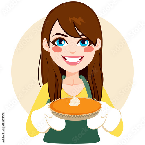 Young brunette woman holding pumpkin pie on thanksgiving party