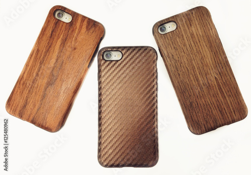 Three wooden iphone cases