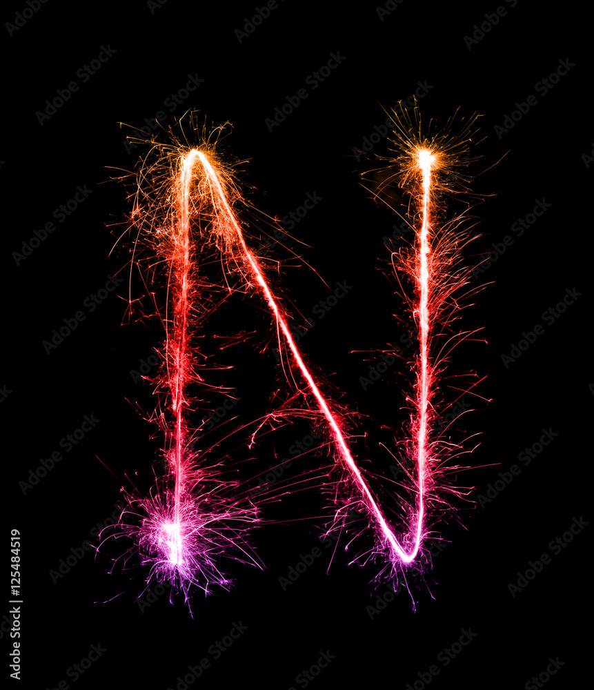 Sparkler firework light alphabet N (Capital Letters) at night