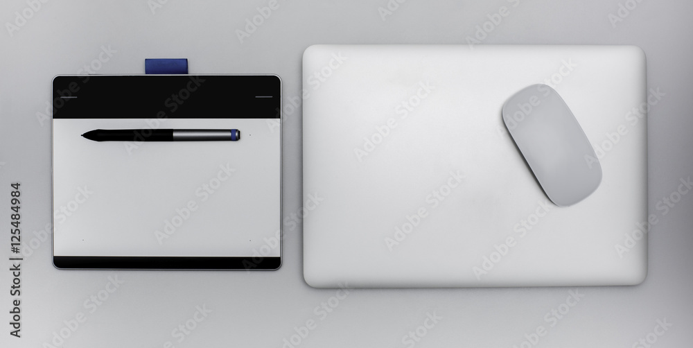 Digital graphic tablet and steel laptop