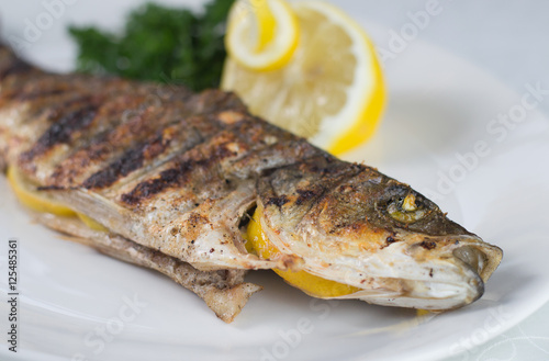Fish seabass (labrax),fish on the grill,Greek cuisine