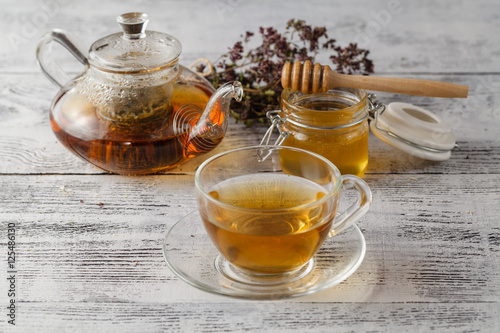 warm honey tea with herbs. Healthcare concept