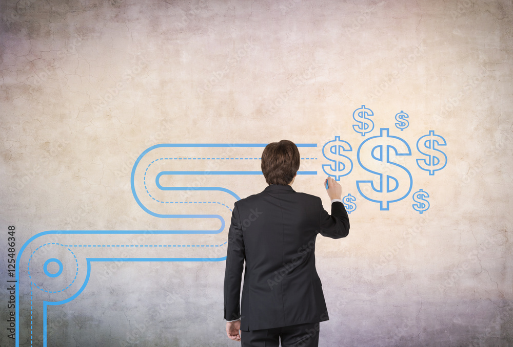 Man drawing dollar pipeline on concrete wall Man drawing dollar pipeline on concrete wall