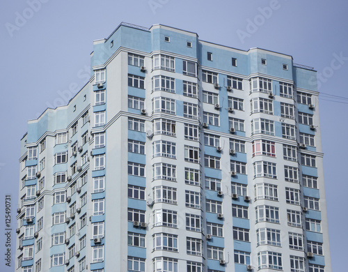 Multi-storey residential building on a background of the sky © maykal