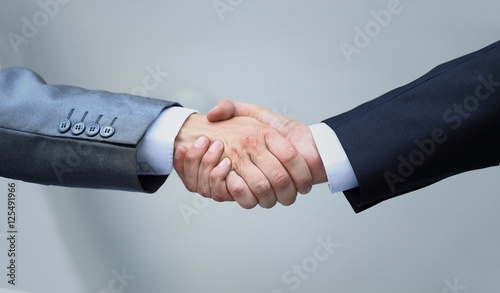shaking hands in the office at the beginning of the working day