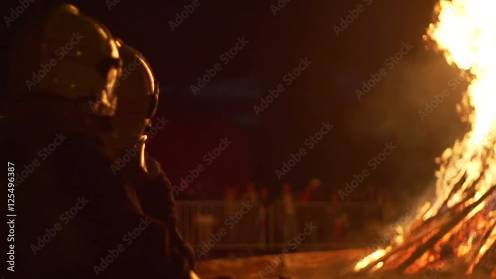 Firemen slowmotion fire