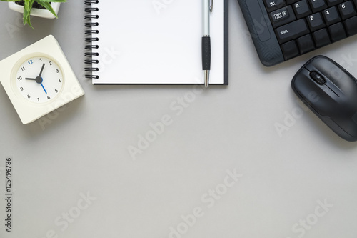 Table top view of office desk with stationery