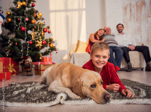 Child playing with pet on holiday