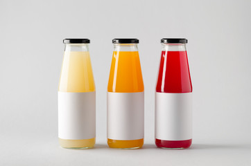 Juice Bottle Mock-Up - Three Bottles. Horizontal Label
