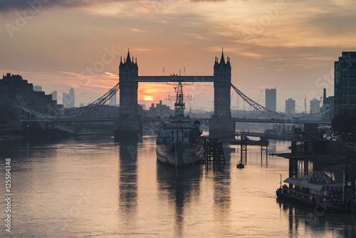 Golden Autumn sunrise over Tower Bridge in London.