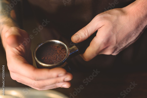 ground coffee grains in a portafilter