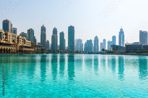 Skyline view of Dubai  UAE  reflected in a pool