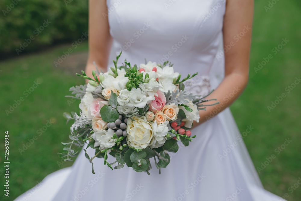 bridal bouquet in hands of the bride bridal bouquet in hands of the bride