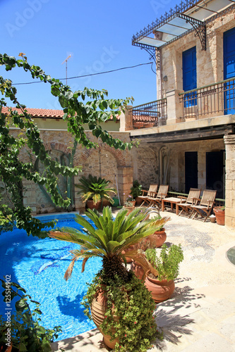 pool terrace on summer greek village resort  Greece