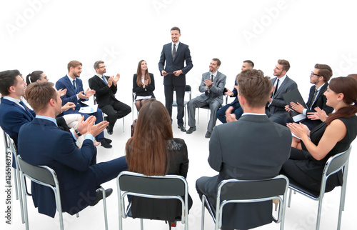Business group greets leader with clapping and smiling