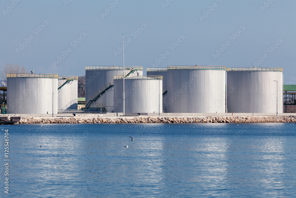 large tanks for petrol and oil, blue sky large tanks for petrol and oil, blue sky