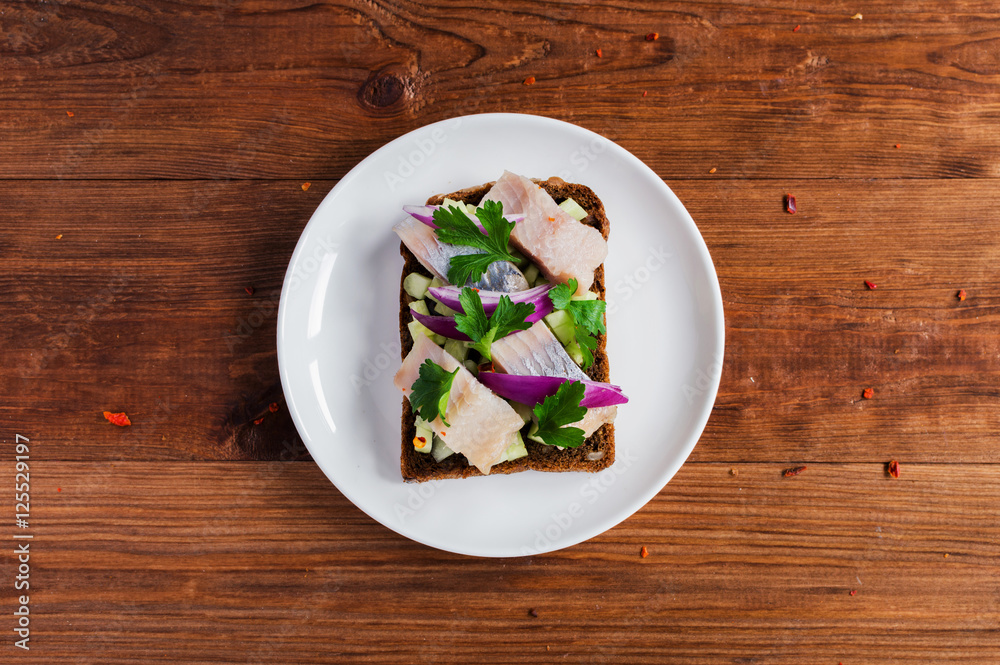 Smorrebrod - danish open sandwich with fish, herring Smorrebrod - danish open sandwich with fish, herring