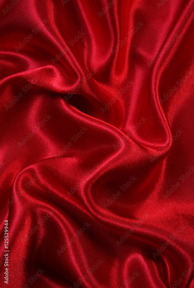 Smooth elegant red silk as background Smooth elegant red silk as background
