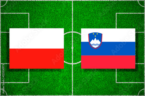 Flag of Poland - Slovenia on the football field. soccer friendly match