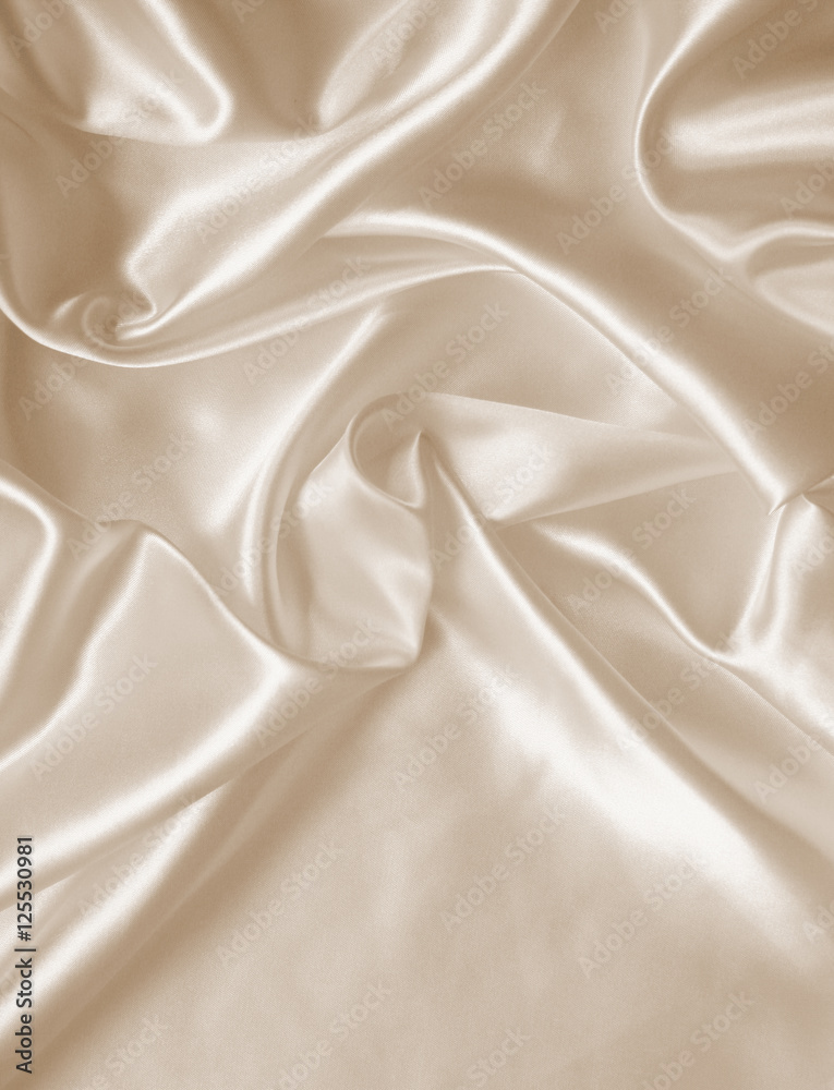 Fototapeta premium Smooth elegant golden silk as wedding background. In Sepia toned