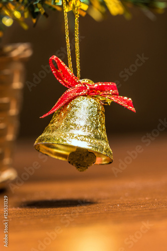 Toys and decorative bell on the Christmas tree