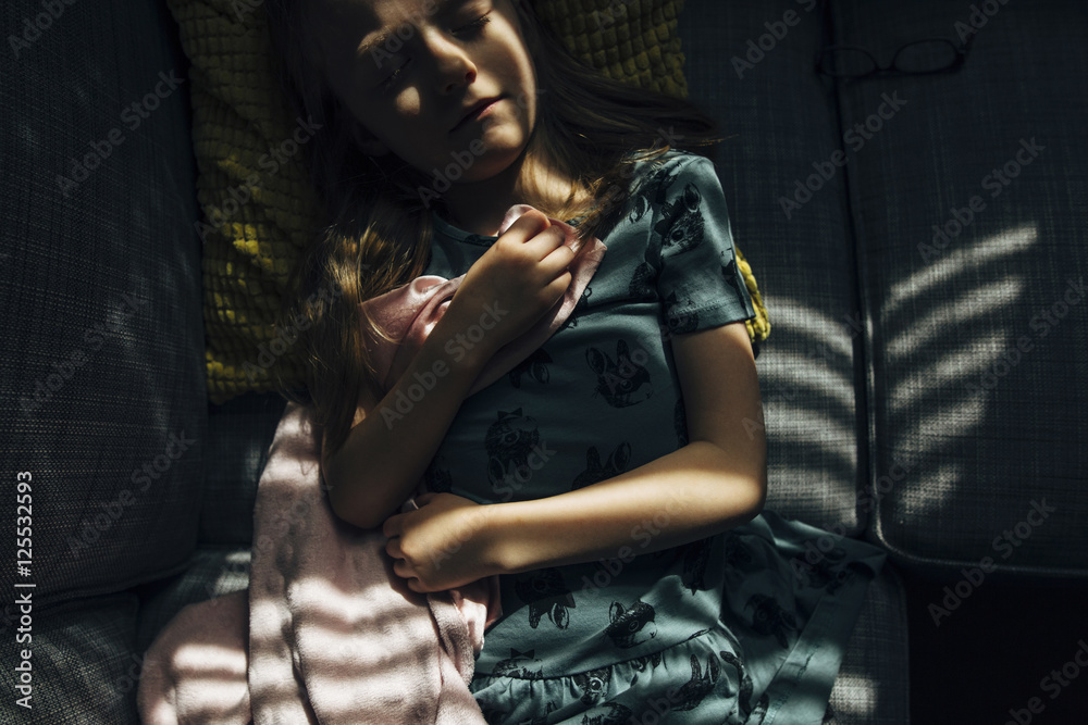 Overhead view of girl sleeping on bed Overhead view of girl sleeping on bed