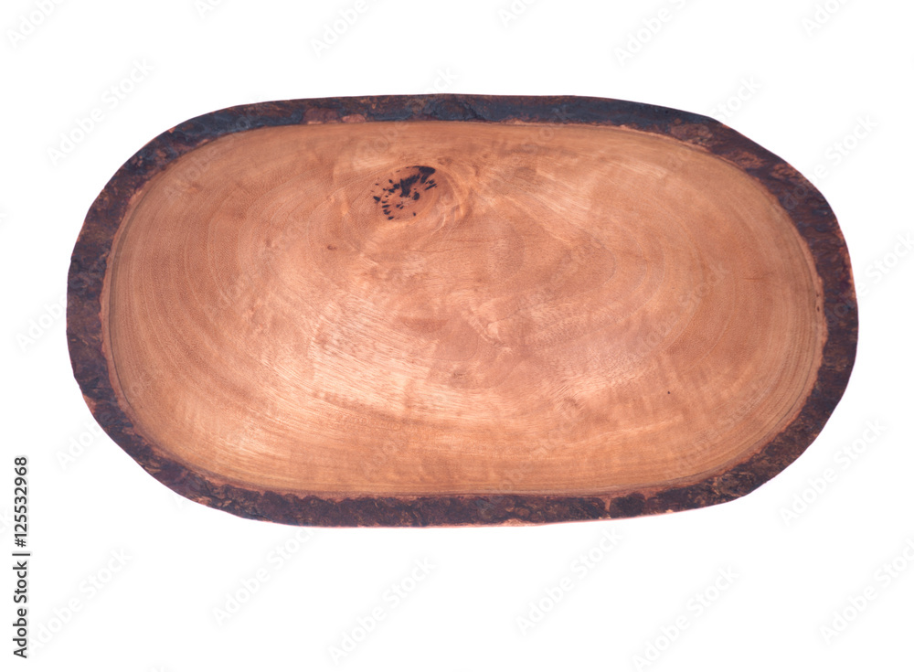 Olive wood wavy rim small bowl isolated on white background Olive wood wavy rim small bowl isolated on white background