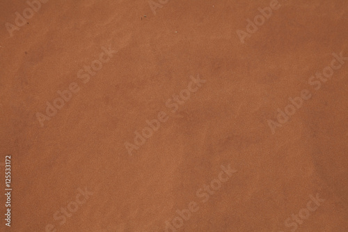 фотографія A texture of red sand